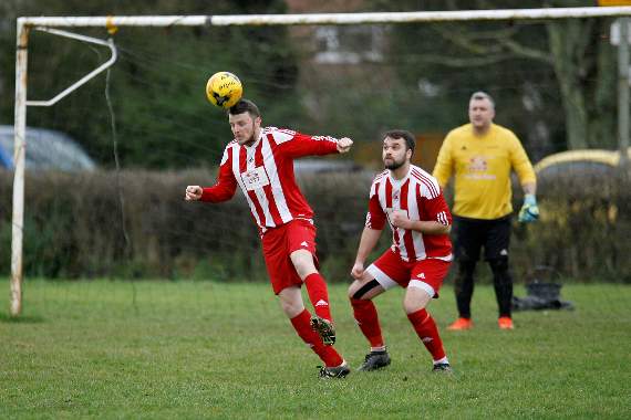 Sam Fennigan heads clear