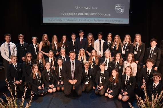 The UK's most successful school gymnastics team with Andy Birkett, centre
