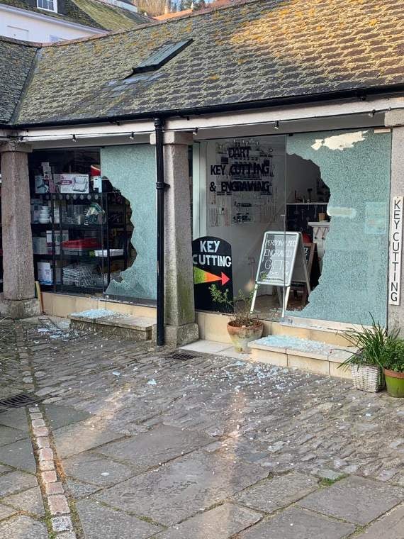Key cutting shop with smashed window