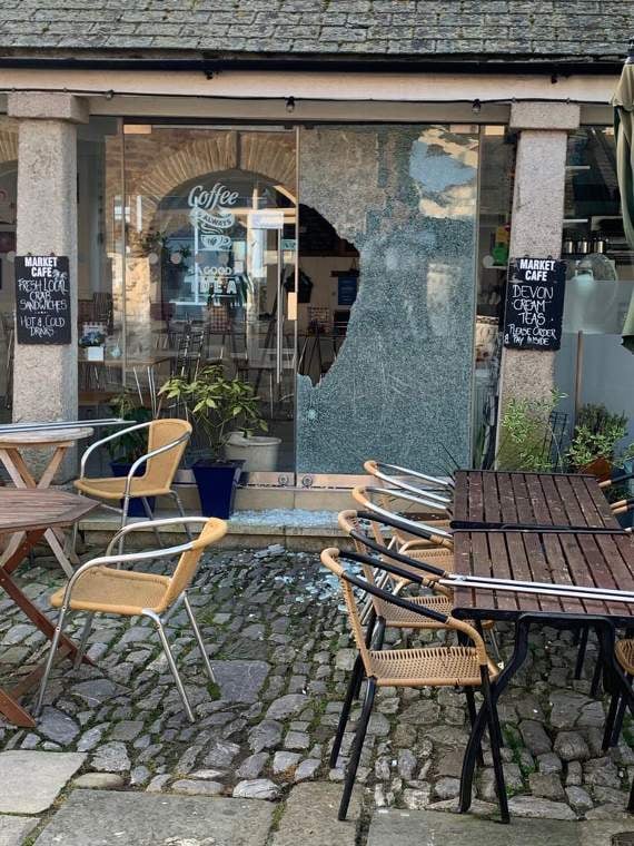Market Cafe with smashed windows