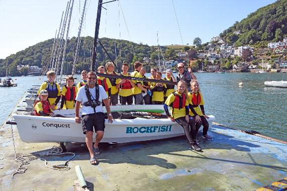 Mitch Tonks with the Royal Dart Sailing Trust, who benefitted from the restaurant's donations (Credit: Michael Green)