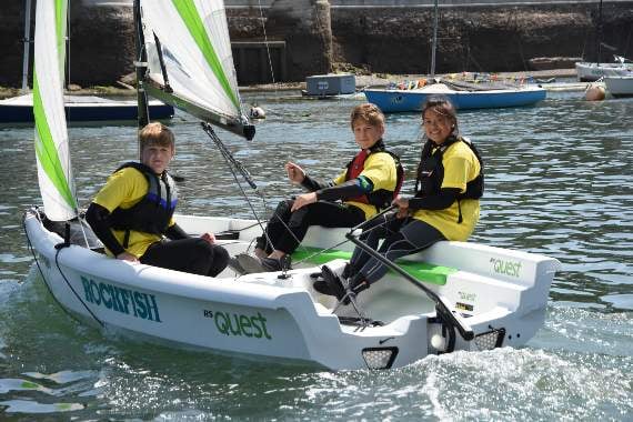 Young sailors aboard their dinghies on the River Dart (Credit: Michael Green)