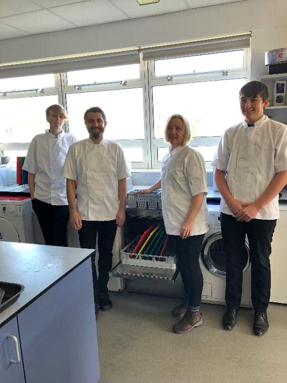 Serin Aubrey from Dartmouth Food Festival and Jenny Chanter from Dartmouth Academy with academy pupils