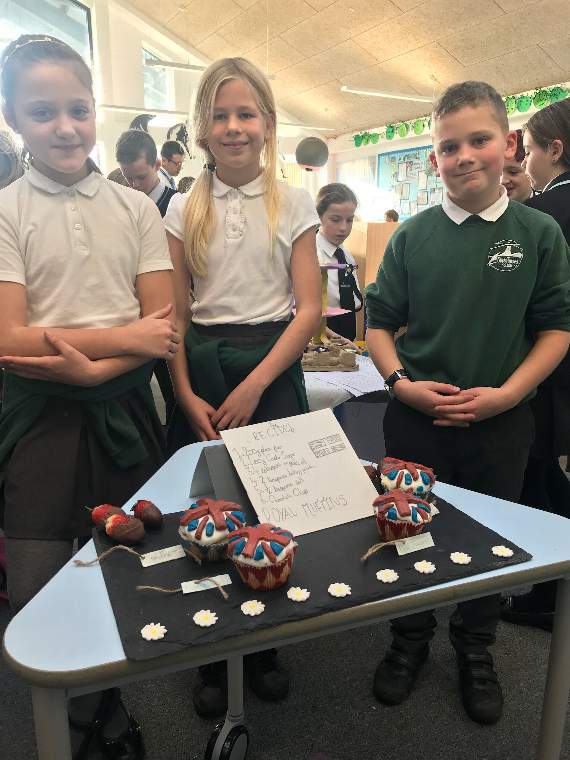 Callum, Theo and Noah preparing their presentation table