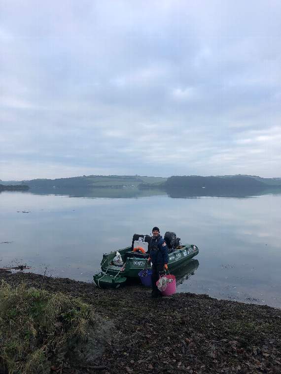 Gary Jolliffe uses his boat, Coast Clear One, to clear marine litter from hard-to-reach areas of the shoreline (Credit: Kristen Bounds)