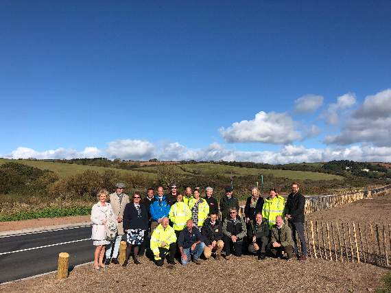 District and county officials, as well as representatives who were involved in the planning and construction of the road