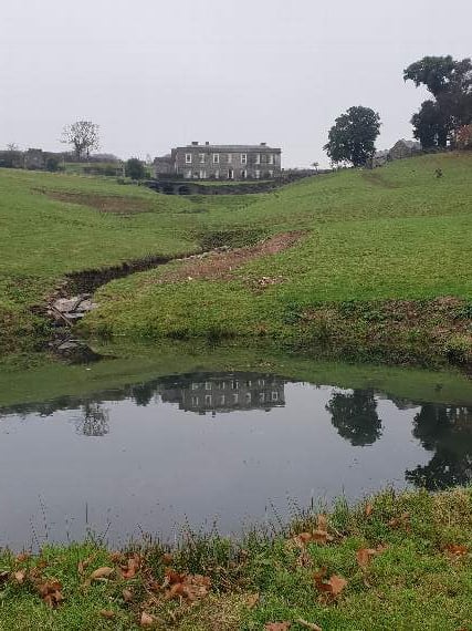 Shilstone House and one of its reflection pools