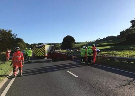 The car overturned in the crash (Credit: Buckfastleigh Fire Station)