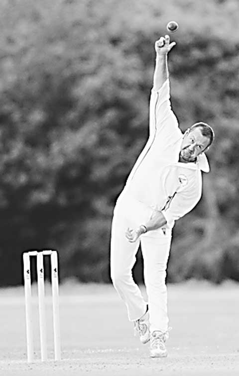 Chagford’s Neil Roland delivers a ball Picture by abphotographic.com