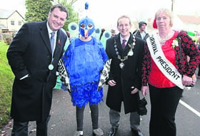 Young peacock Benjamin Rogers with Central Devon MP Mel Stride, Hatherleigh Mayor Andy Gilbert and carnival president Alma Knight. Picture by James Bird.
