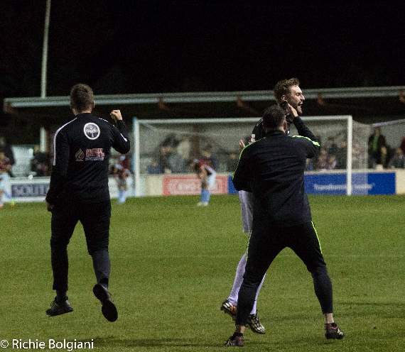 The final whistle blows and the Tavistock staff celebrate their progress into the next round.