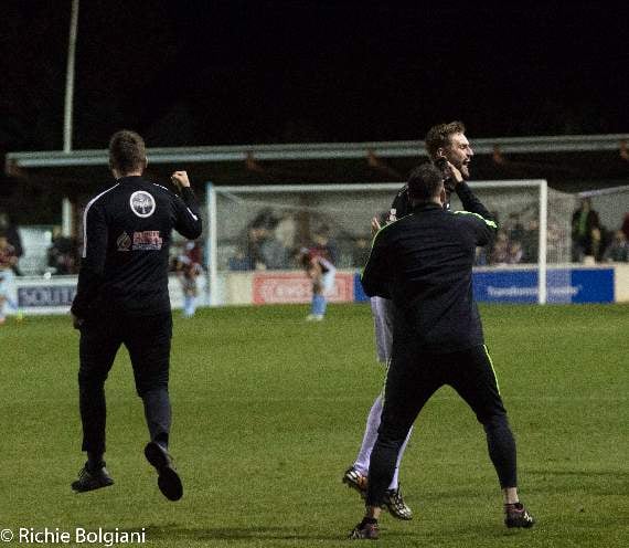 The final whistle blows and the Tavistock staff celebrate their progress into the next round.