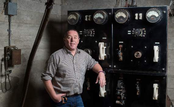 Wesley Key with the century old system. Photos by John Millar/National Trust.