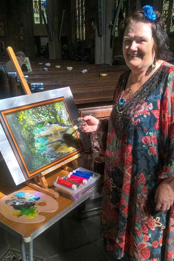 Phyllis Hughes with her art.
