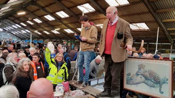 Auctioneer Philip Pyle is seen here as chief auctioneer in the world record attempt. Pictures by James Bird