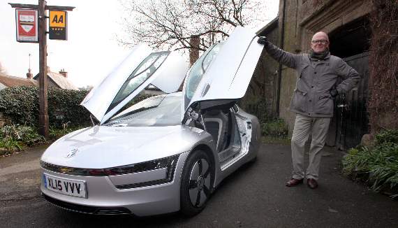 Ed Stratton from Winkleigh with his incredible VW Production XL1 butterfly wing car that weighs less than a Tesla battery.