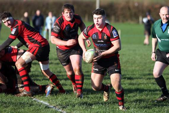 Tom Pearson looks for space.