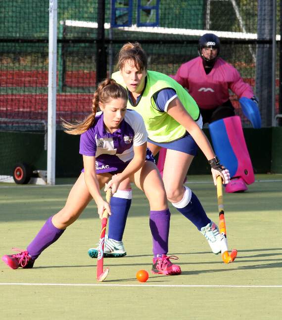 Okehampton ladies’ seconds (in white and purple) up against White Eagles. Pictures by James Bird