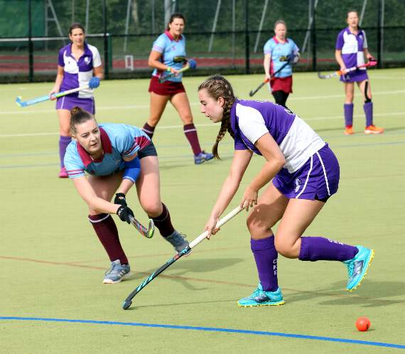Action between Okehampton firsts (in purple and white) and visitors Bude at Simmons Park on Saturday. Pictures by James Bird