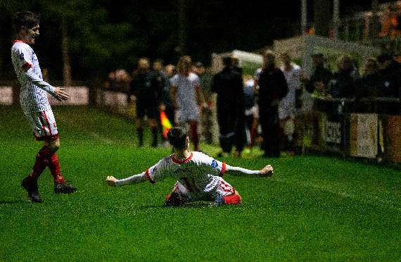 Tavistock's Jack Crago celebrates after scoring his hat-trick. Pictures by Dave Crawford