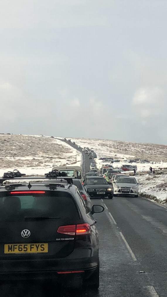 Cars were parked on both sides of the road on Dartmoor on New Year's Eve causing traffic problems. Picture by Stephen Earp.