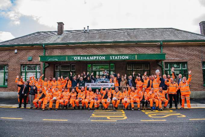 The Network Rail team with Transport Secretary Grant Shapps outside the station.