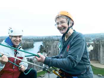 Brave Mayoress Mrs. Karen Nicholas manages to raise a smile as she’s about to be lowered over the castle wall.