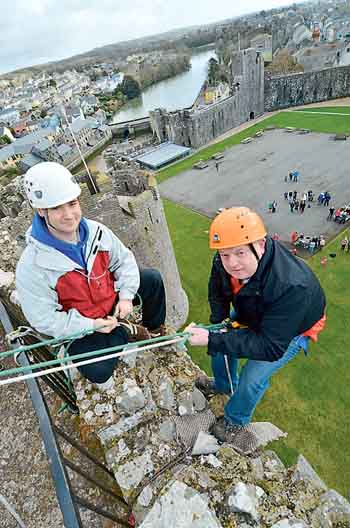 On top of the world! Mayor Clr. Keith Nicholas as among those who abseiled down the Great Tower at Pembroke Castle on St. David’s Day.