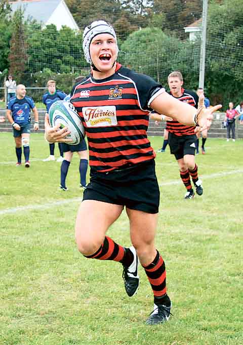 Luke Hansford can hardly contain his delight as he crosses the line to score Tenby’s second try.