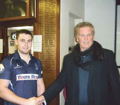 Narberth Athletic man-of-the-match against Newport, Thomas Rees, with chairman John Owen.