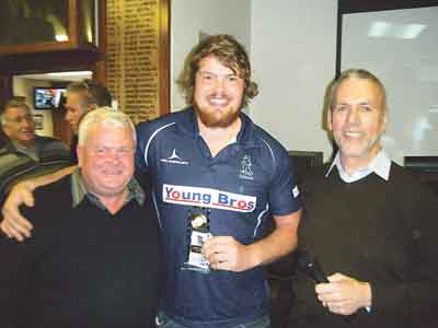 Health Centre Balcony Suite match sponsors ‘Friends of Narberth RFC’ man-of-the-match Adam Clark with John Rice and Ken Morgan.