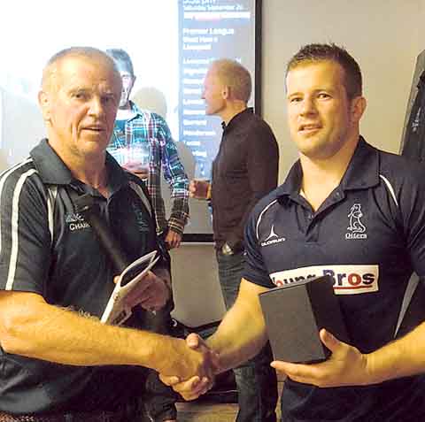 Lewis Wood gets an award from Narberth RFC chairman John Owen after clocking up his 100th game for the Otters when he played at Newbridge the week before. Well done Lewis.