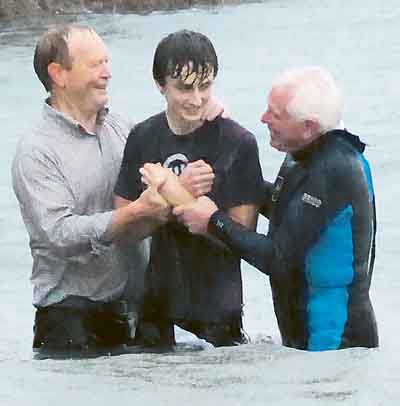 Lloyd Rees is baptised.