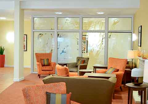 The glass screen in the restaurant and lounge at the new ‘Homes for Life’ development.