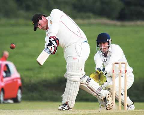Captain, Rhys Davies, on his way to a score of 19 in the Carew innings.