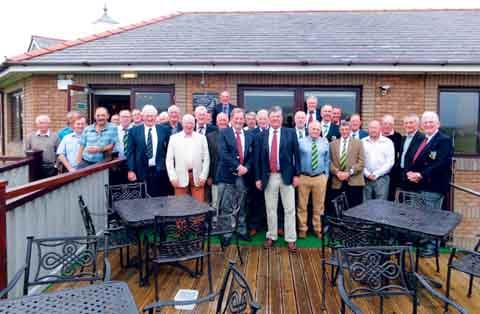 Tenby skipper Richard Ormond and Pennard captain Ken Nieman with members of their respective teams.