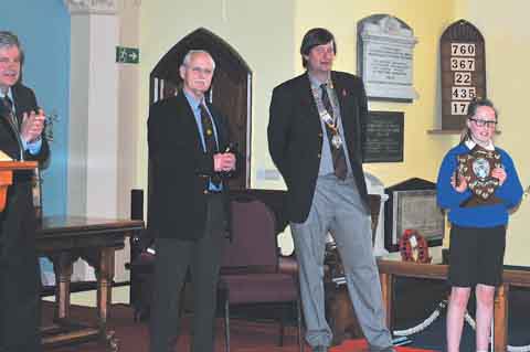 Rotary president Nigel Ayers and the judges Tom Cullen and Robert Smith with winner Hope Yeates.
