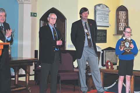 Rotary president Nigel Ayers and the judges Tom Cullen and Robert Smith with winner Hope Yeates.