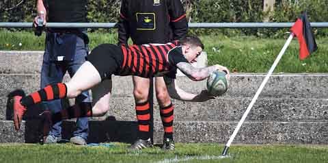 Damian Miller flies over for Tenby’s third try. Pic. Susan McKehon