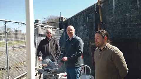Masters of the barbecue, Terry Threlfell GW4TGT and Jim Lyons GW0WGN, with Damien Hill MW0DMH, right. Pic. Heinz Holland MW0ECY