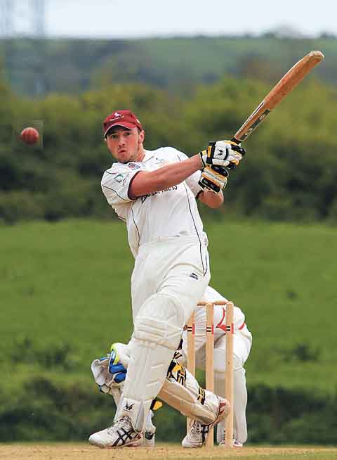 Iwan Izzard powers another six over the boundary on his way to 97 for Cresselly.
