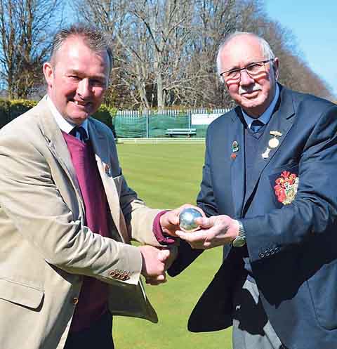 Pembroke Dock Bowling Club chairman, Mr Alan Yea, handed the silver jack to Simon Hart for rolling on the green.