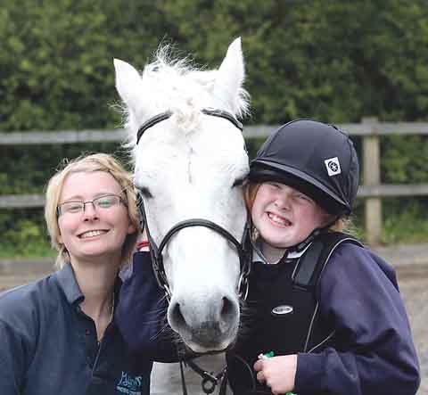Staff member Lotti Russell (me!) with Freddie and rider Caitlin Marshall.
