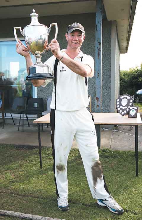 Greg Miller with the D. R. Morris Trophy.