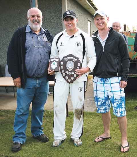 Man-of-the-Match Ashley Sutton receives his award from Bill Carne and Fraser Watson.
