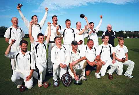 Neyland CC celebrate winning the D. R. MorrisCup for the third year in a row.