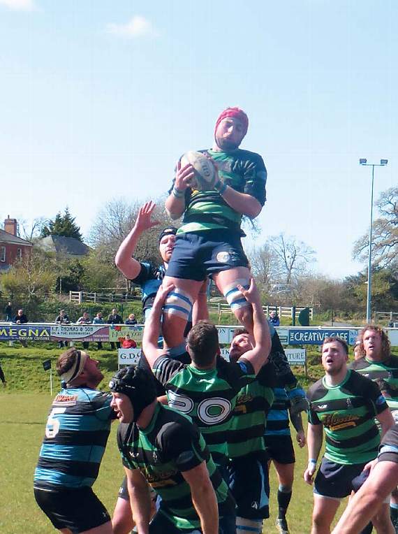 Narberth’s man of the match Alex Jenkins rises high to win ball at a lineout. Pic. Stephen Thomas
