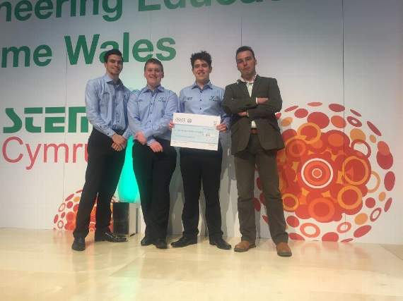Pictured (from left): Apprentices James Griffiths, Tom Preece and Jordan Gough with Paul Evans (senior technical trainer) collecting their award for ‘Best Working Model or Prototype’ at the Engineering Education Scheme Wales Awards.
