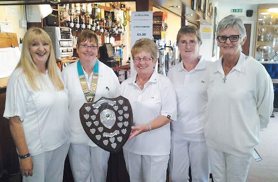 Anniversary Shield winners on the Sutton Street green last week were the Haverfordwest rink. WWLBA president Pam Langdon is seen presenting the shield to Wynn Howells, Mandy Lewis and Mary Cobb, with Tenby Ladies captain Carol Lloyd looking on.