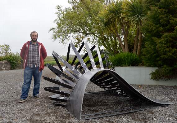 Louis pictured with his creation which has been entered into the Broomhill National Sculpture Prize.